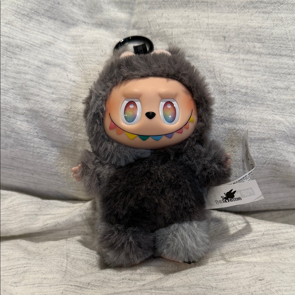Gray Plush Toy with Colorful Face
